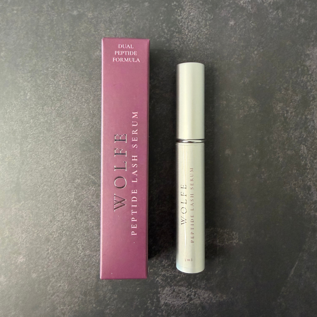 Wolfe Peptide Lash Serum 3ml silver tube on dark background